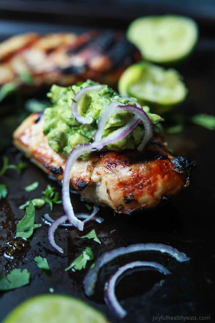 Grilled Cilantro Lime Chicken with Avocado Salsa - a healthy, easy, 30 minute meal packed with fresh zesty flavors. This chicken recipe will quickly be a favorite! | joyfulhealthyeats.com #paleo