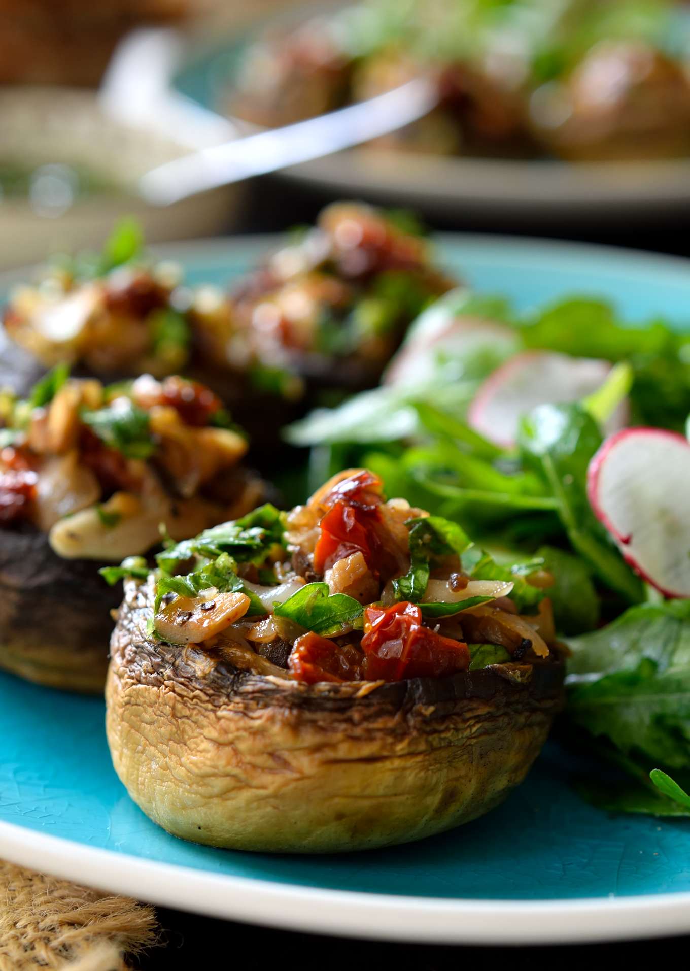 Vegan stuffed mushrooms are easy to make and packed with fresh herb-y, garlicky, citrus-y deliciousness. These little guys are great served as party finger food, a starter or a light main dish when paired with a fresh salad and crusty bread.