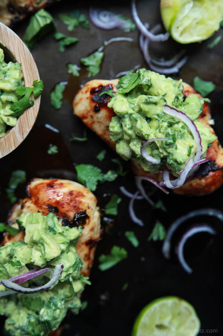 Grilled Cilantro Lime Chicken with Avocado Salsa - a healthy, easy, 30 minute meal packed with fresh zesty flavors. This chicken recipe will quickly be a favorite! | joyfulhealthyeats.com #paleo