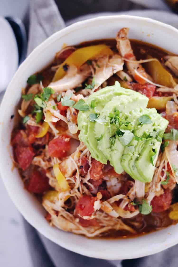 Crockpot Chicken Enchilada Soup overhead one bowl close up