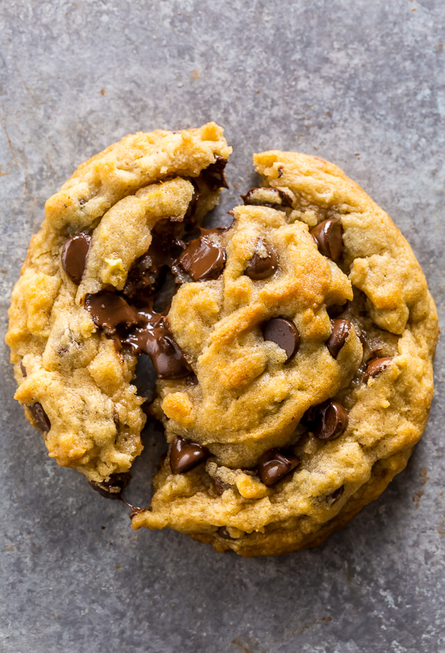 These Vegan Chocolate Chip Cookies are thick, chewy, and loaded with gooey chocolate. No one will guess they're vegan!